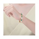 Radiant 14K Gold Plated Bangle Bracelet with Emerald Cubic Zirconia